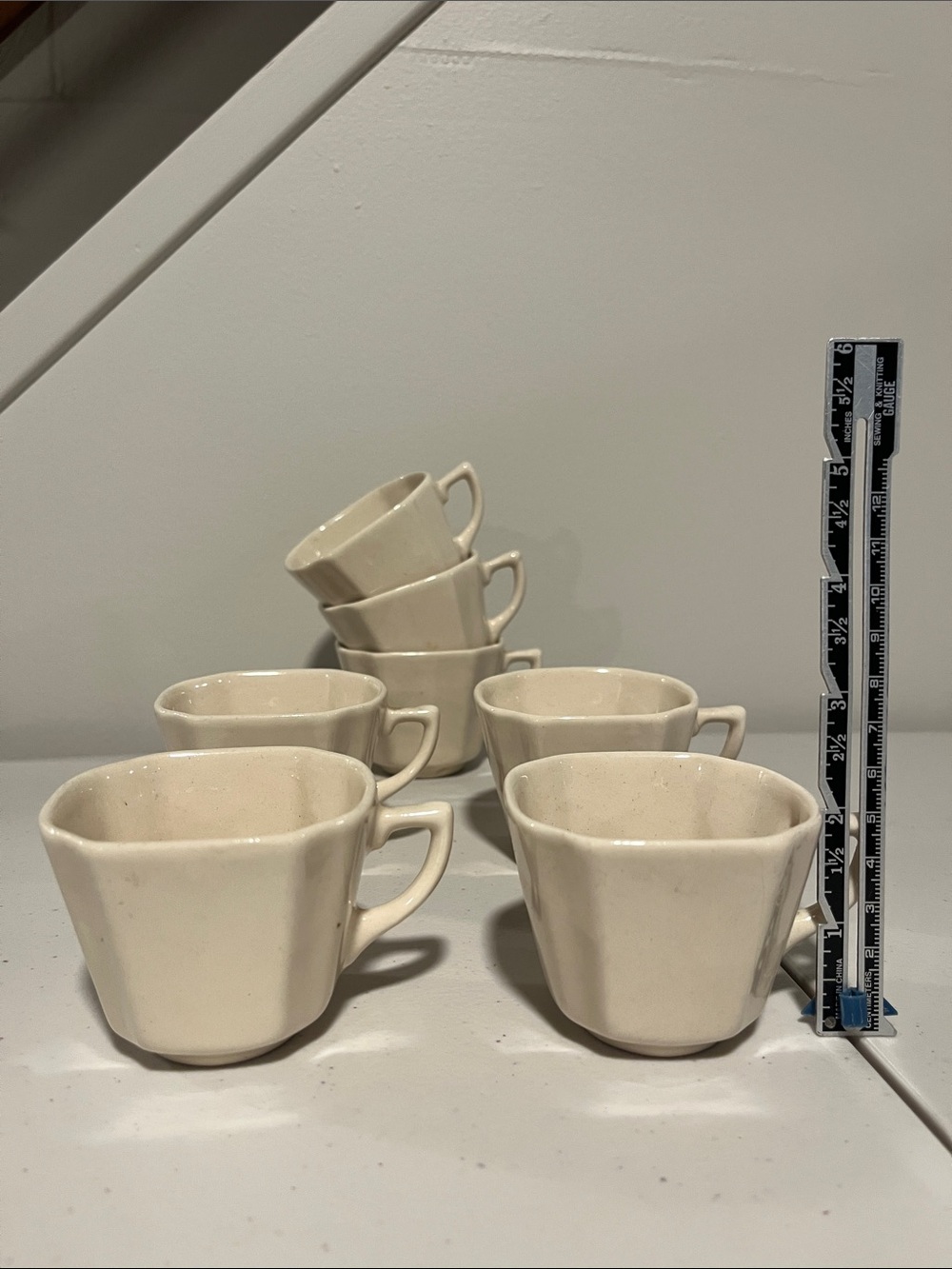 Four cream colored 2” tall china tea cups. Childrens, Non labeled. 1970’s